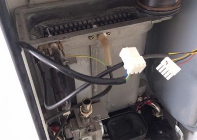 Open boiler panel showing internal mechanism